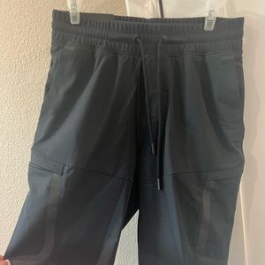 Men’s black under armour shorts - size small or would fit as a youth XL